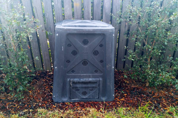 Composting bin installed in garden