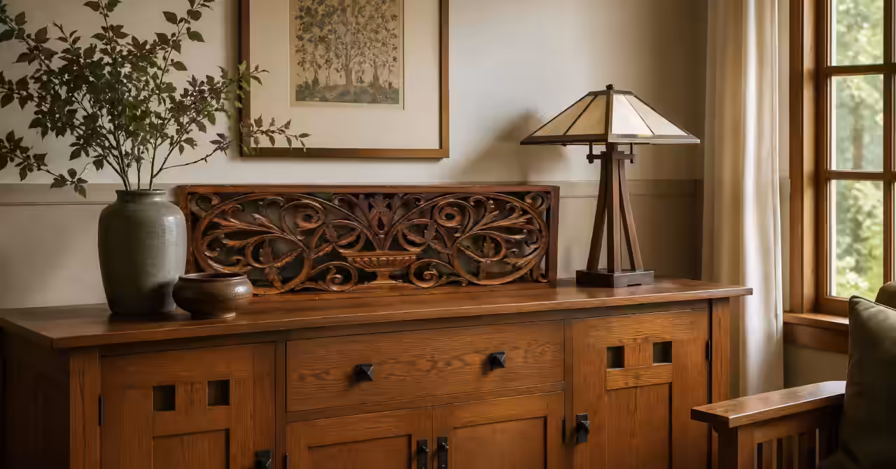 Victorian carved timber fretwork panel displayed in a warm Arts and Crafts interior with soft lighting and layered decorative textures.