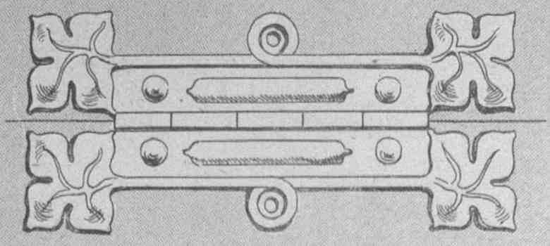 antique metal hinge design with a square leaf pattern