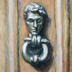Vintage English door knocker design with male face